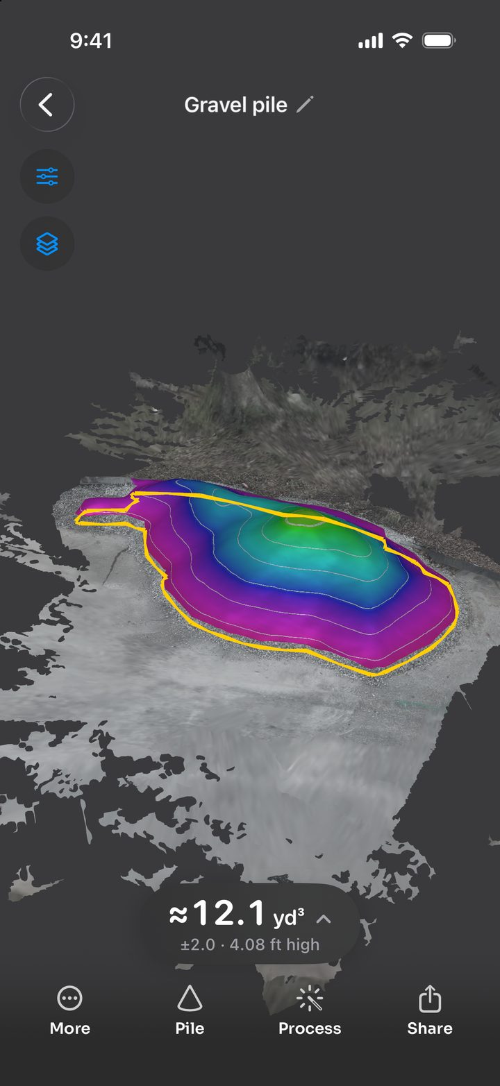 The scanned gravel pile in 3D, colored by height inside a yellow border, with its volume below it: about 12.1 cubic yards, plus or minus 2.0, and 4.08 feet high.